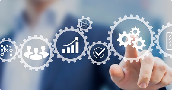 A professional pointing at an icon - Big Catch Consulting